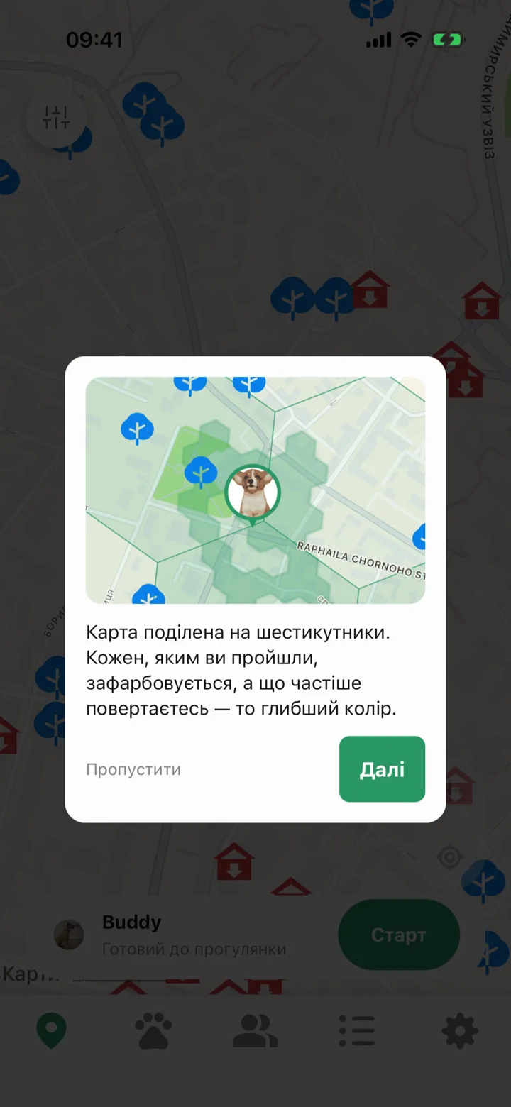 Картка підказки з мапою, поділеною на шестикутники, зафарбовані там, де пес уже гуляв